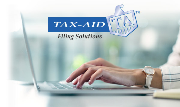 Tax-Aid Filing Solutions being used on a laptop